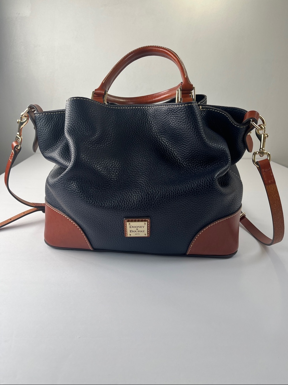 Dooney & Bourke Navy Pebbled Leather Shoulder Bag with Brown Trim